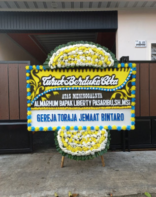 Papan Bunga Duka di Uwapa