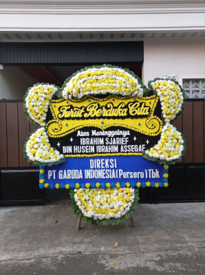 Papan Bunga Duka di Uwapa